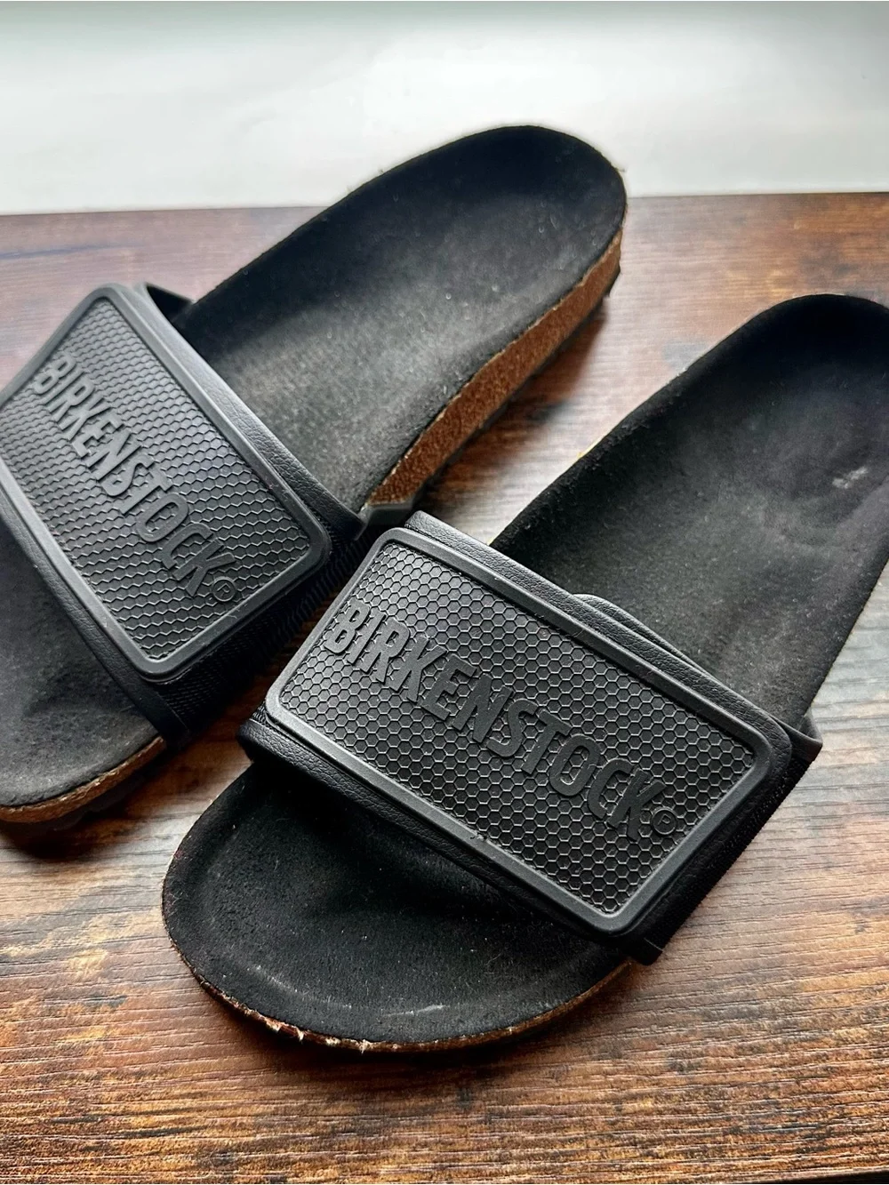 Birkenstock Tema Black Slide Sandals with Embossed Strap
